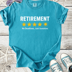 Turquoise retirement t-shirt with stars and sun graphic, featuring 'No Deadlines, Just Sunshine' slogan.