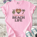 Pink beach themed graphic t-shirt with peace sign, sunset heart, palm tree, and ‘Peace Love Beach Life’ text