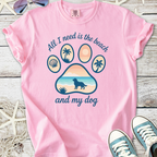Pink cotton t-shirt with 'All I need is the beach and my dog' graphic, featuring a paw design and beach scene.