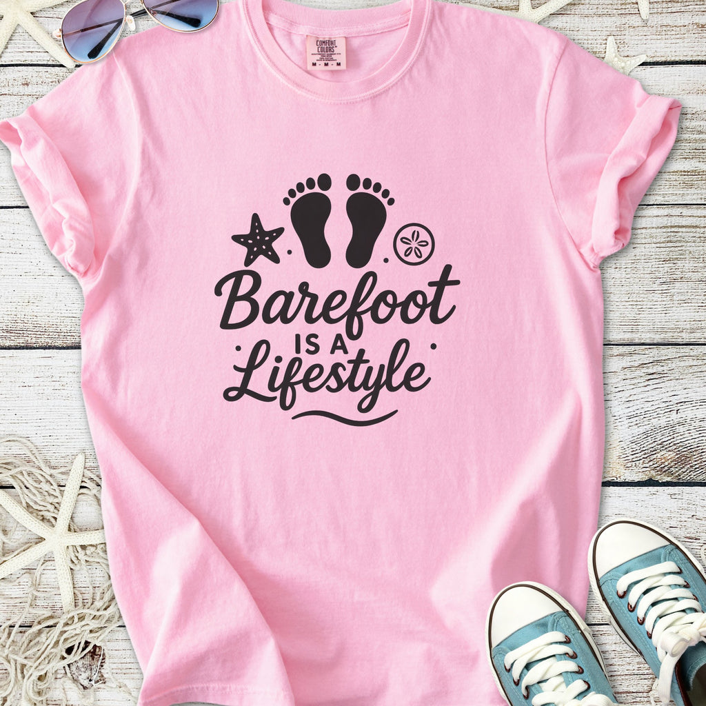 Pink cotton t-shirt with 'Barefoot is a Lifestyle' graphic and starfish design for casual beach wear.