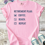 Pink cotton t-shirt with 'Retirement Plan: Coffee, Beach, Repeat' graphic design.