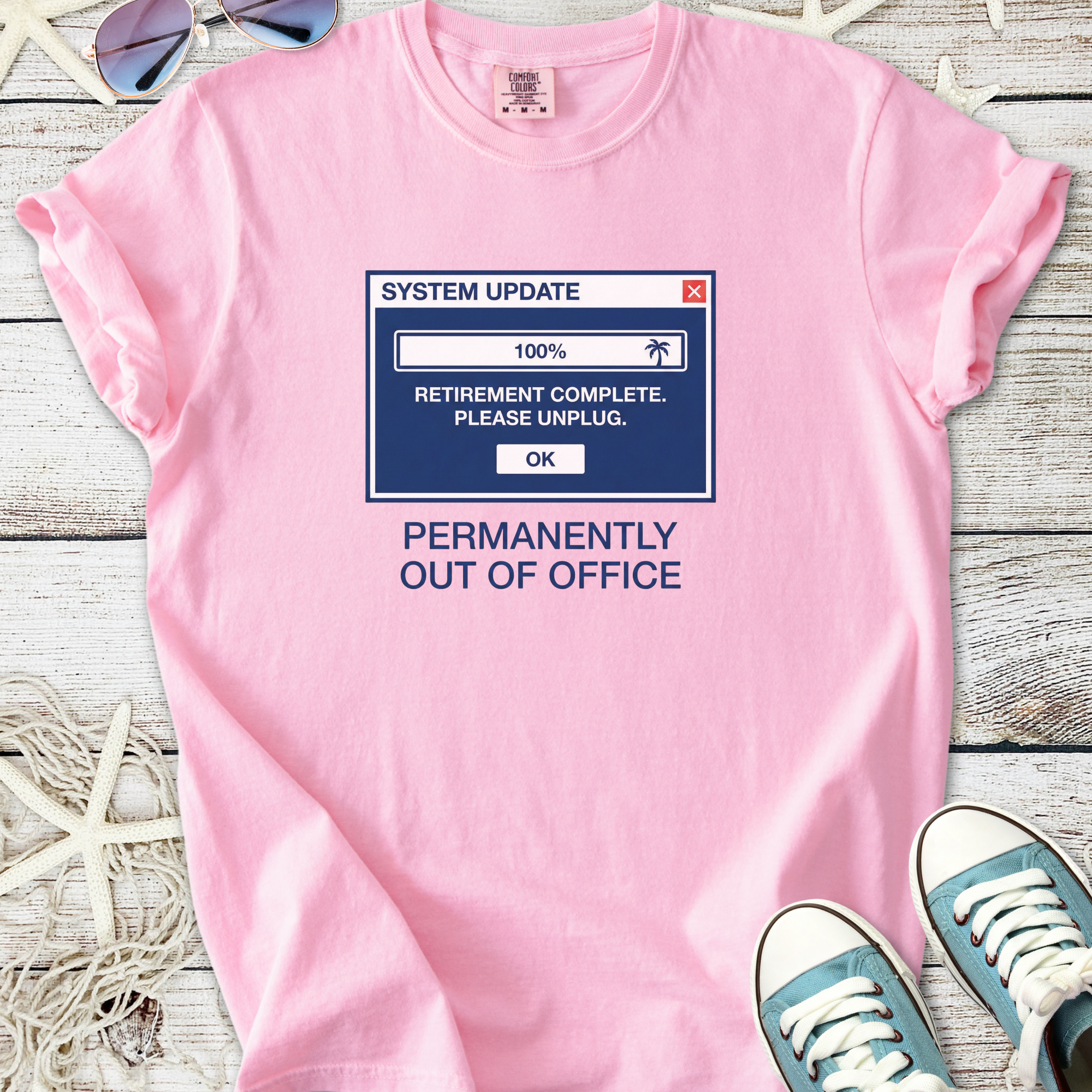 Light pink t-shirt with 'System Update' graphic, featuring humorous retirement message.