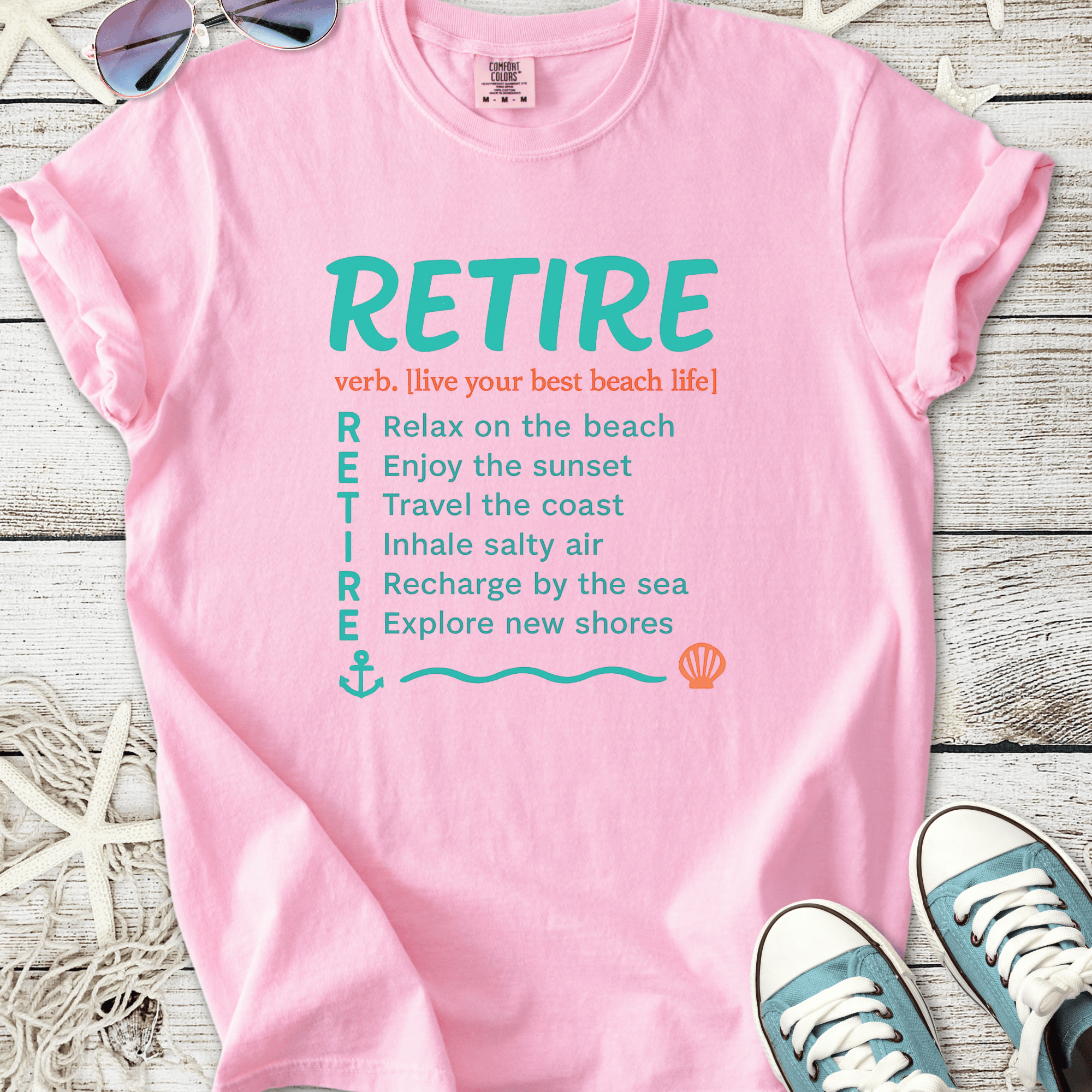 Pink cotton t-shirt with 'RETIRE' graphic and beach life tips for a relaxed lifestyle.