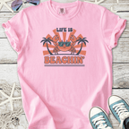 Pink graphic tee featuring a playful crab design with 'Life is Beachin'' text and palm trees.