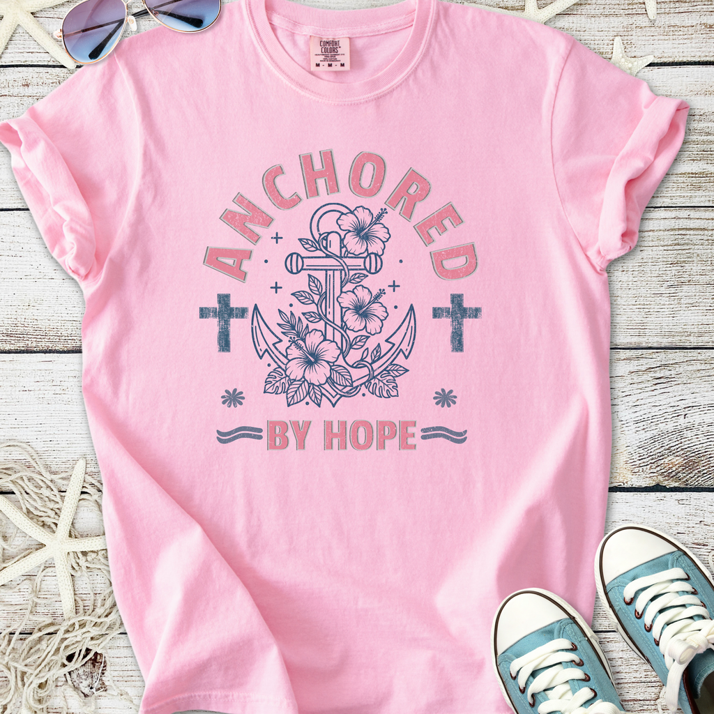 Pink cotton t-shirt with 'Anchored by Hope' graphic featuring an anchor and floral design.