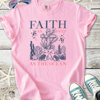 Cute pink t-shirt with ocean-themed design, featuring turtles and a cross, promoting faith.
