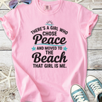 Pink graphic tee with beach-themed quote, perfect for casual summer style.