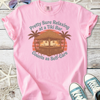 Pink cotton T-shirt with a Tiki bar graphic, promoting relaxation and self-care, perfect for casual outings.