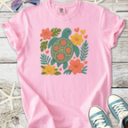 Pink t-shirt with turtle and floral design, casual style, 100% cotton, perfect for summer outings.