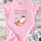 Pink graphic tee featuring a cool duck lounging with "Too Cool for a 9 to 5" text, perfect for casual wear.
