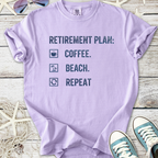 Light purple retirement plan t-shirt featuring coffee, beach, and repeat graphics on soft cotton material.