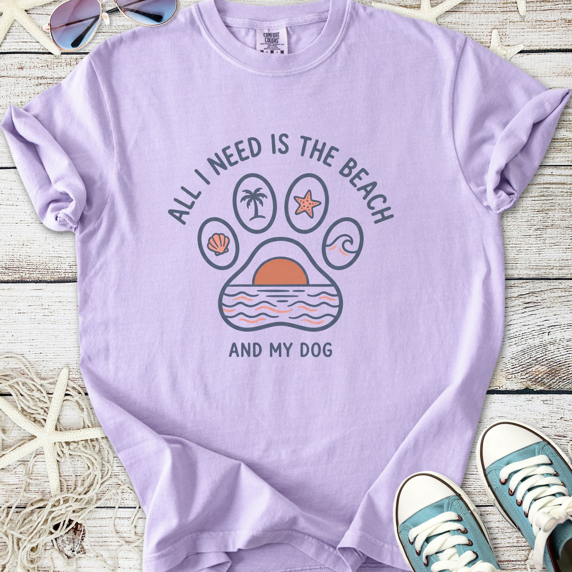 Light purple t-shirt with beach-themed graphic and 'All I need is the beach and my dog' text.