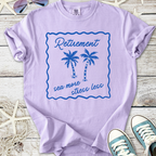 Light purple t-shirt with palm tree design and 'Retirement sea more stress less' print.