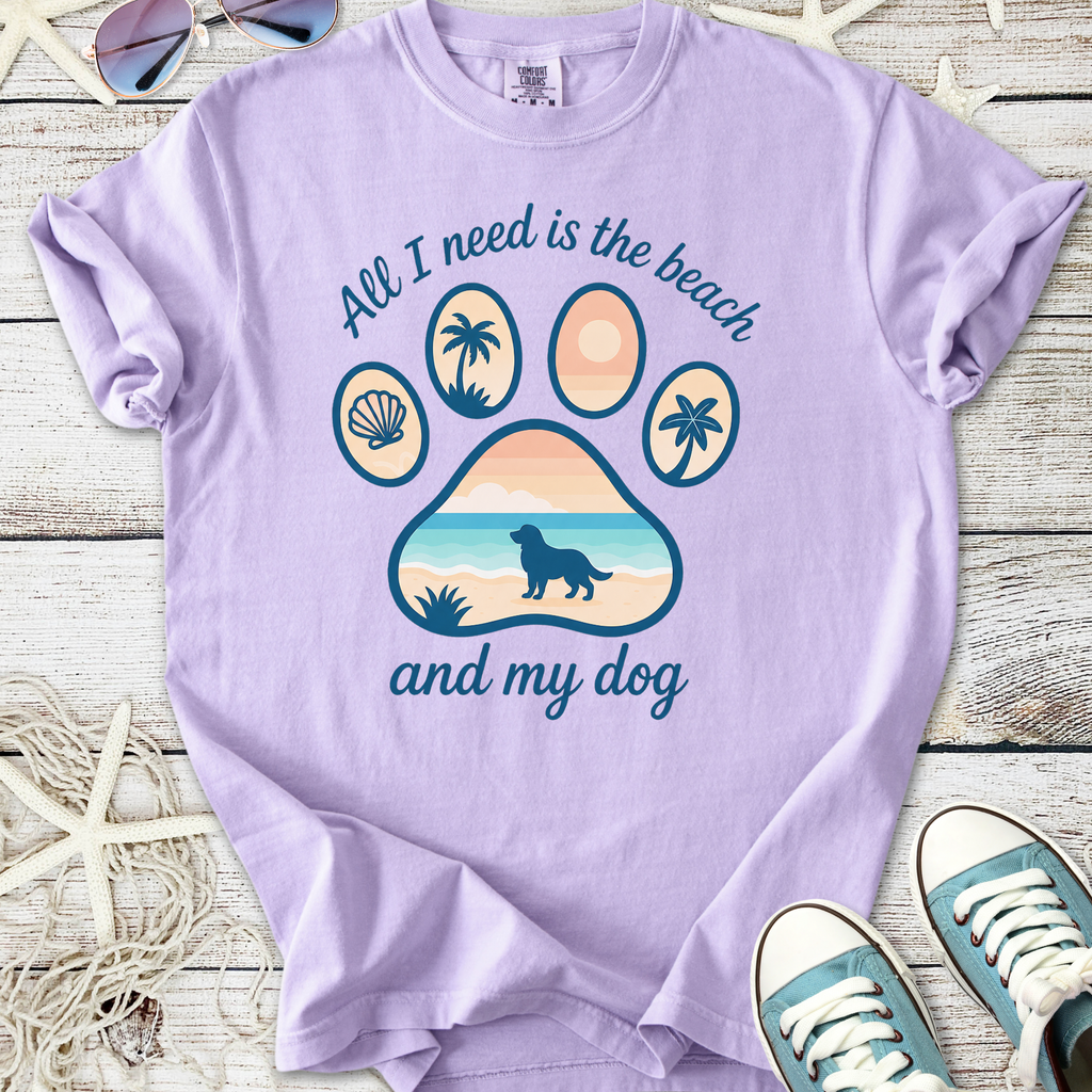 Light purple t-shirt with beach-themed dog paw print design and text, perfect for pet lovers.