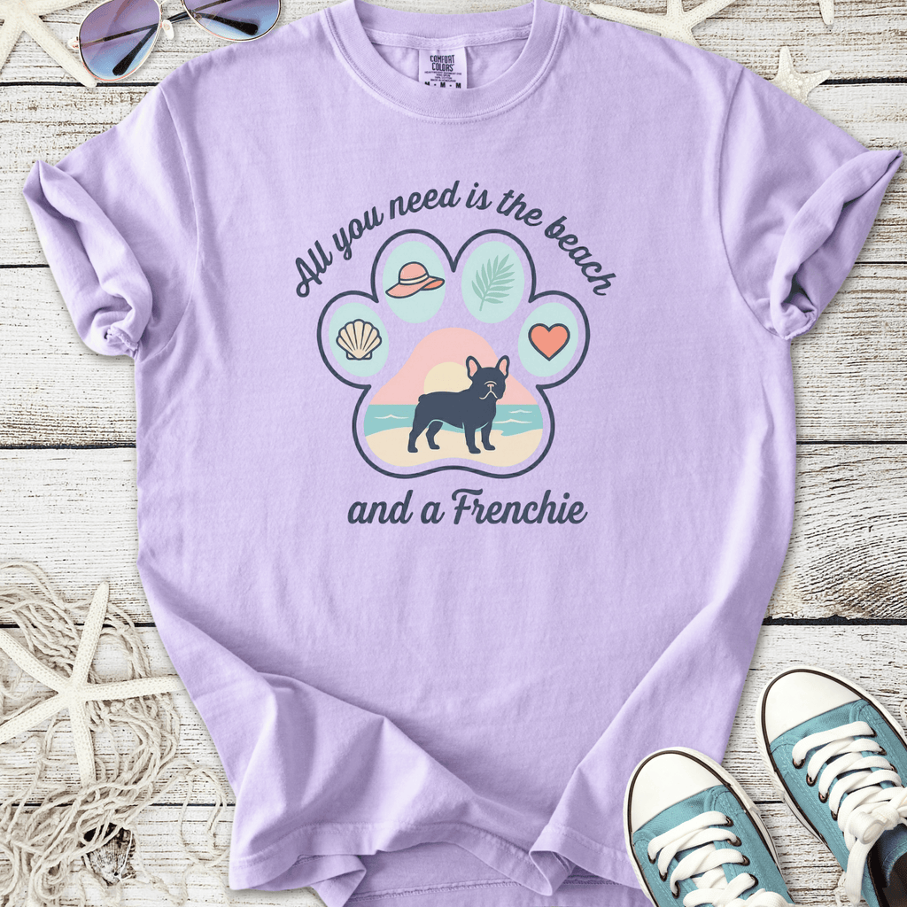 Lavender graphic tee featuring a French Bulldog, beach theme, and playful design elements.