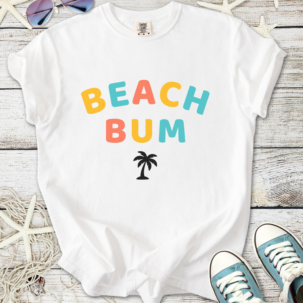 White cotton t-shirt with 'BEACH BUM' print and palm tree, perfect for summer casual wear.