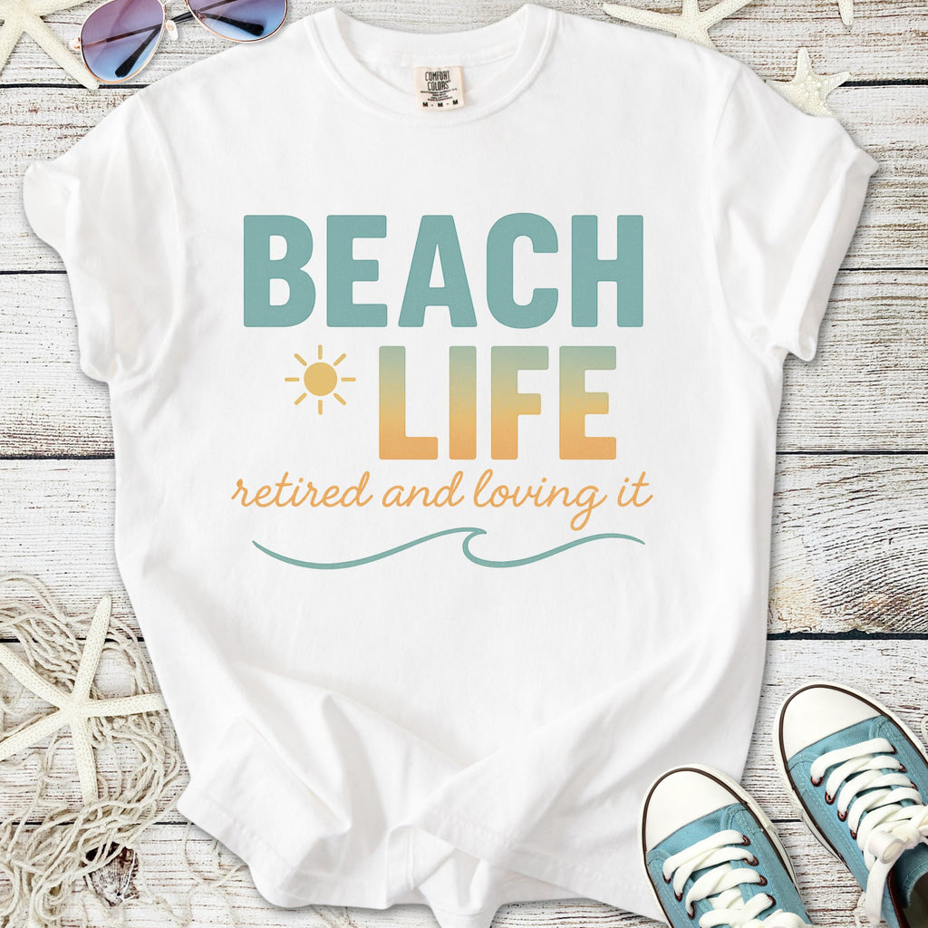 White t-shirt with 'Beach Life' print, perfect for retirees, made from soft cotton.
