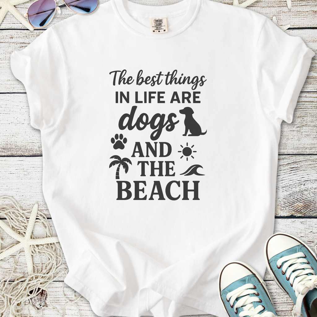 White graphic tee featuring 'The best things in life are dogs and the beach' design on soft cotton.