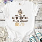 White t-shirt with 'Fueled by Iced Coffee & Sea Breeze' graphic, perfect for coffee lovers.