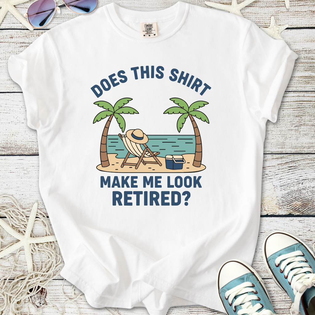 Funny white t-shirt with palm trees and beach design, text says 'Does this shirt make me look retired?'