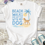 White t-shirt with 'Beach walks are better with my dog' graphic, featuring a golden retriever and palm tree.