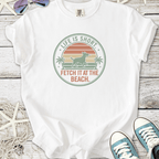 White t-shirt with 'Life is Short, Fetch it at the Beach' graphic, featuring a dog and palm trees.