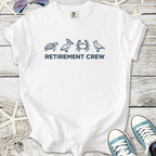 White t-shirt with 'RETIREMENT CREW' text and marine animal graphics, perfect for casual wear.