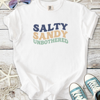 White t-shirt with colorful text: 'Salty Sandy Unbothered', ideal for beach lovers and casual wear.