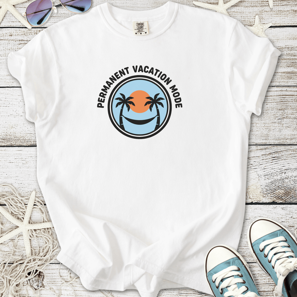 White t-shirt with 'Permanent Vacation Mode' graphic, featuring palm trees and sunset design, casual style.