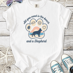 White T-shirt with beach-themed graphic and German Shepherd design, perfect for dog lovers.