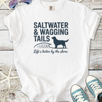 White t-shirt with 'Saltwater & Wagging Tails' graphic, perfect for beach lovers and dog owners.