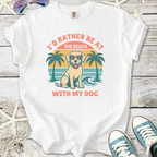 White t-shirt featuring a dog in sunglasses with beach graphic and text, perfect for dog and beach lovers.