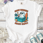 White t-shirt featuring a playful design of a snowman with sunglasses, tropical vibe, and surfboard.