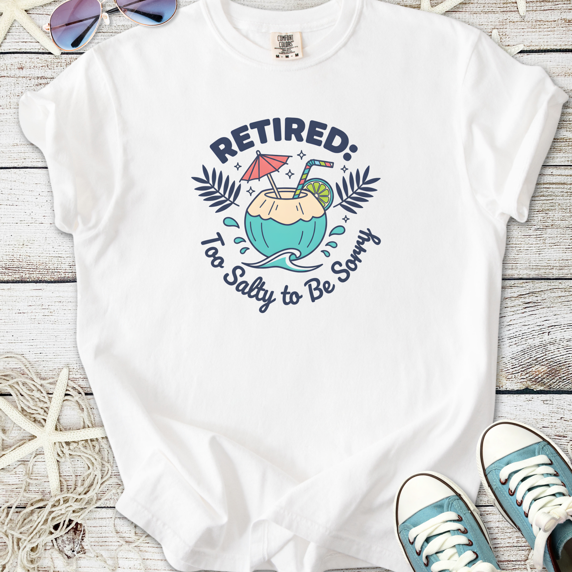 White t-shirt with 'Retired: Too Salty to Be Sorry' graphic, featuring a cocktail design.