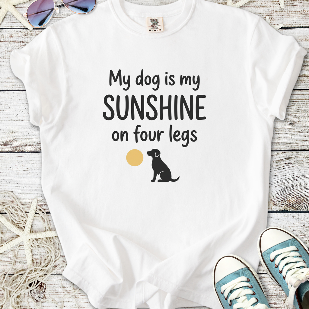 White t-shirt with 'My dog is my sunshine on four legs' print and black dog silhouette.