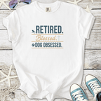 White t-shirt with 'Retired. Blessed. Dog Obsessed.' graphic, perfect for dog lovers.