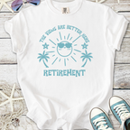 White retirement t-shirt with playful sun graphic and palm trees, perfect for celebrating new adventures.