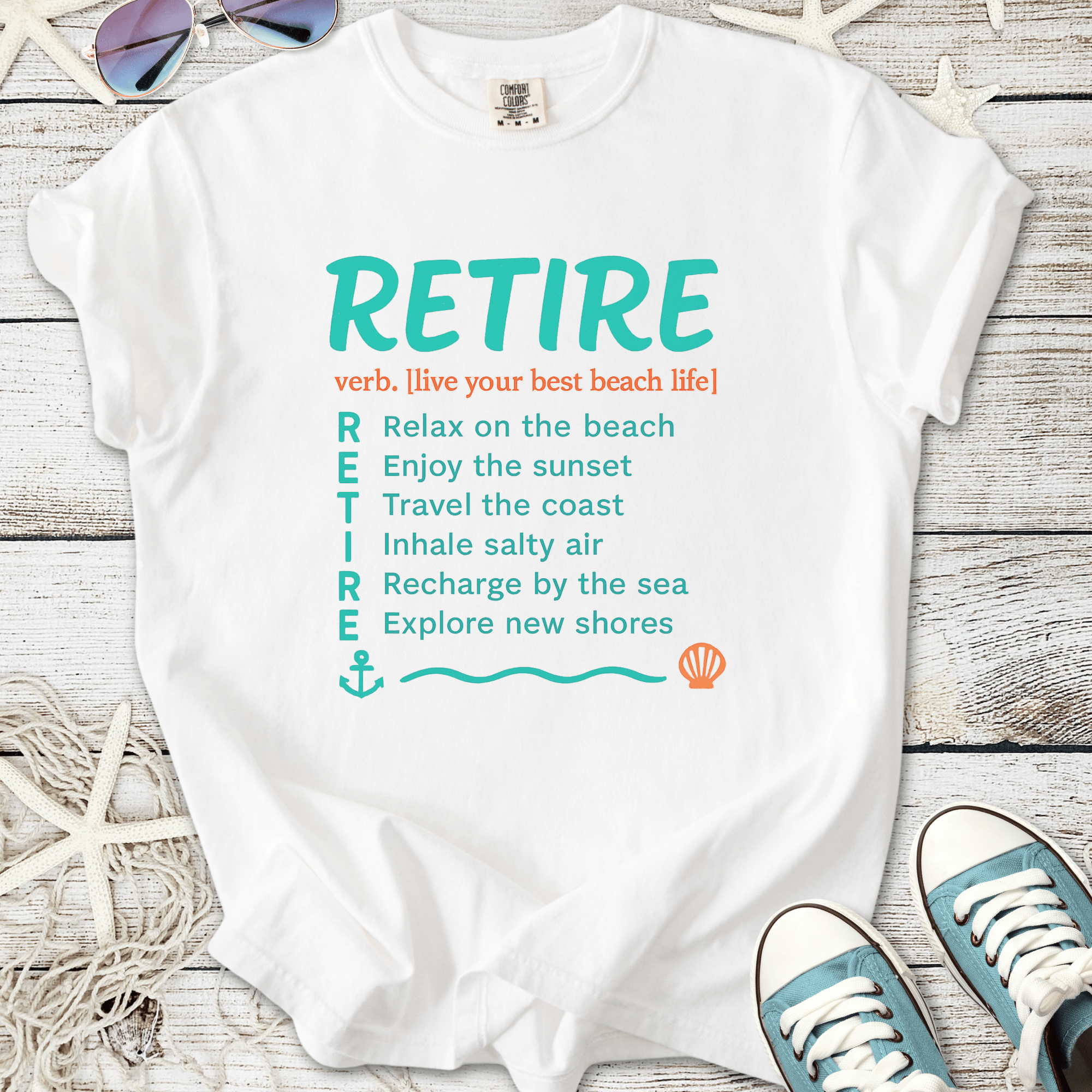 White t-shirt with 'RETIRE' text and beach life definitions, perfect for coastal relaxation.
