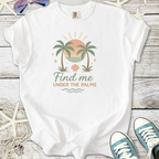 White unisex t-shirt with 'Find me under the palms' graphic, featuring palm trees and a sunset design.