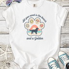 White graphic tee featuring paw print design with beach theme and golden retriever illustration.
