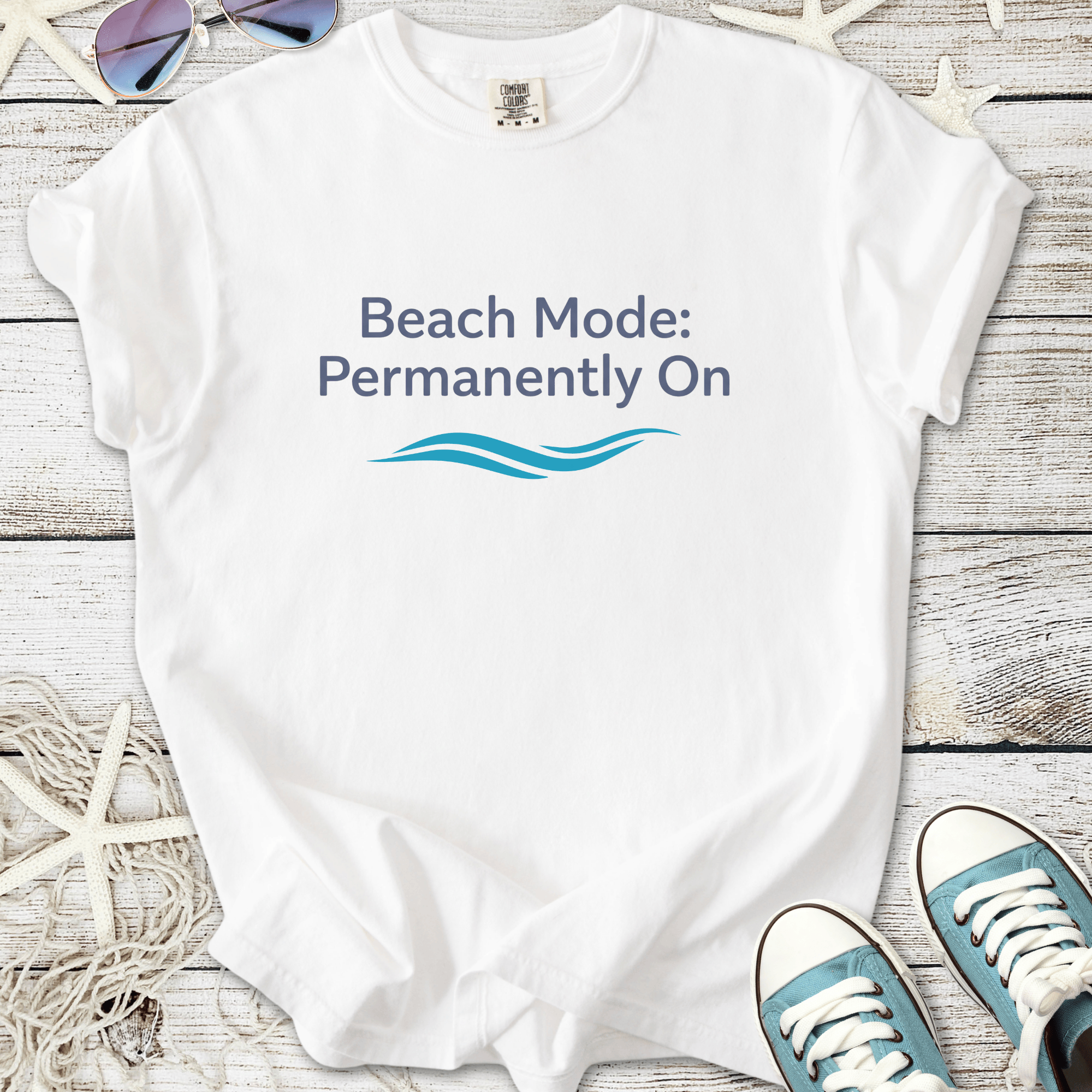 White t-shirt with 'Beach Mode: Permanently On' graphic, perfect for casual summer wear.