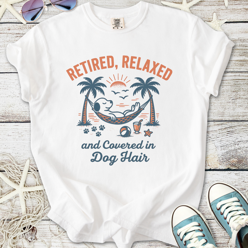 White t-shirt featuring 'Retired, Relaxed, and Covered in Dog Hair' graphic with a dog in a hammock.