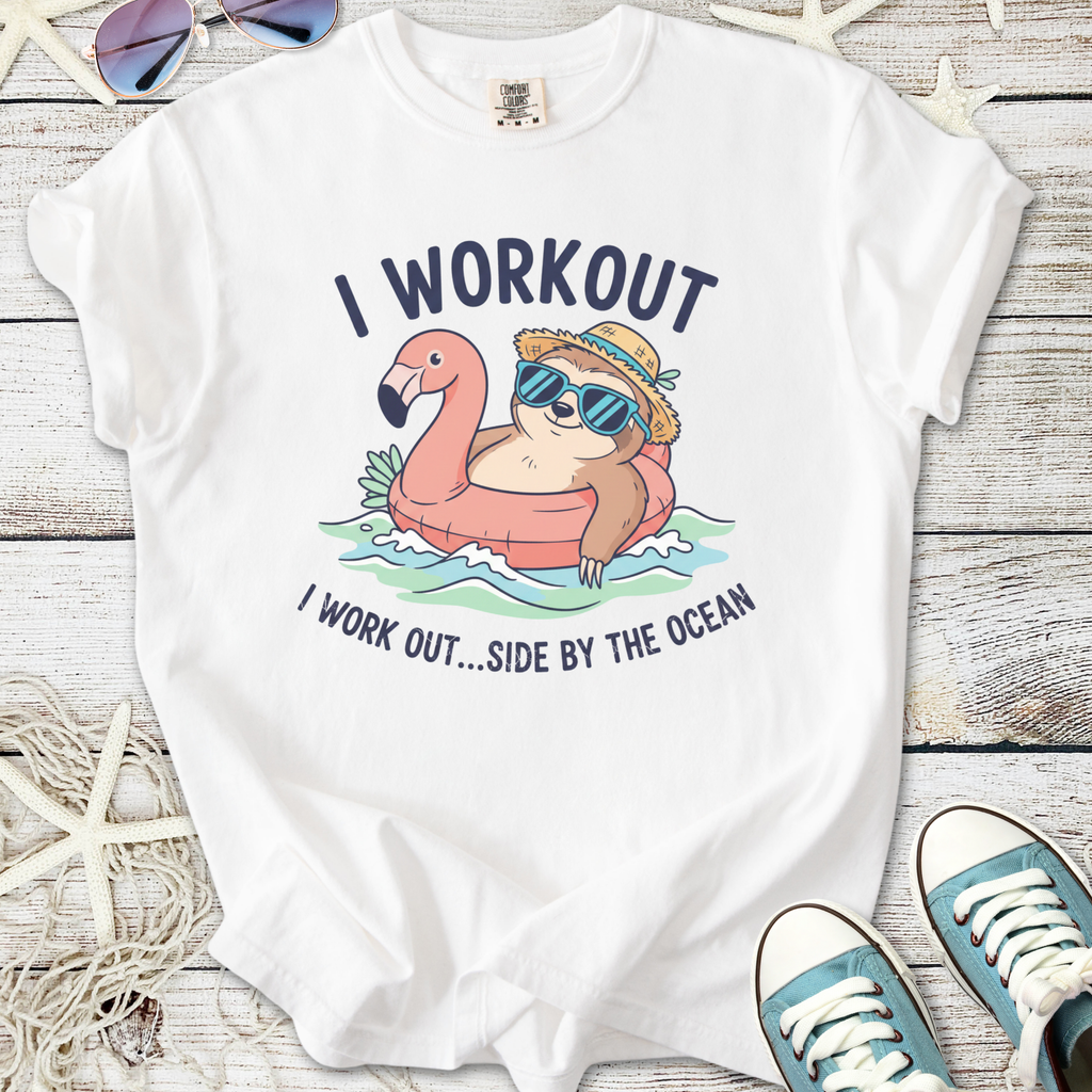 Funny white t-shirt with sloth and flamingo graphic, 'I workout...side by the ocean' design.