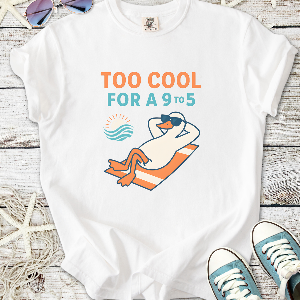White t-shirt featuring a cool duck graphic and the phrase 'Too Cool for a 9 to 5', perfect for casual wear.