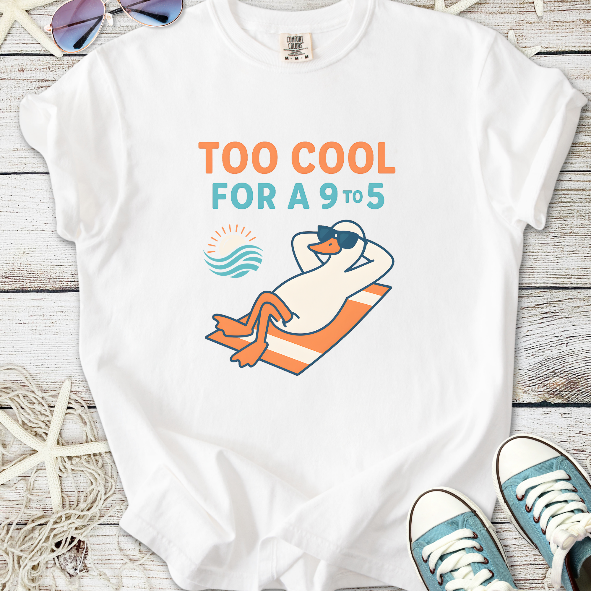 White t-shirt featuring a cool duck graphic and the phrase 'Too Cool for a 9 to 5', perfect for casual wear.