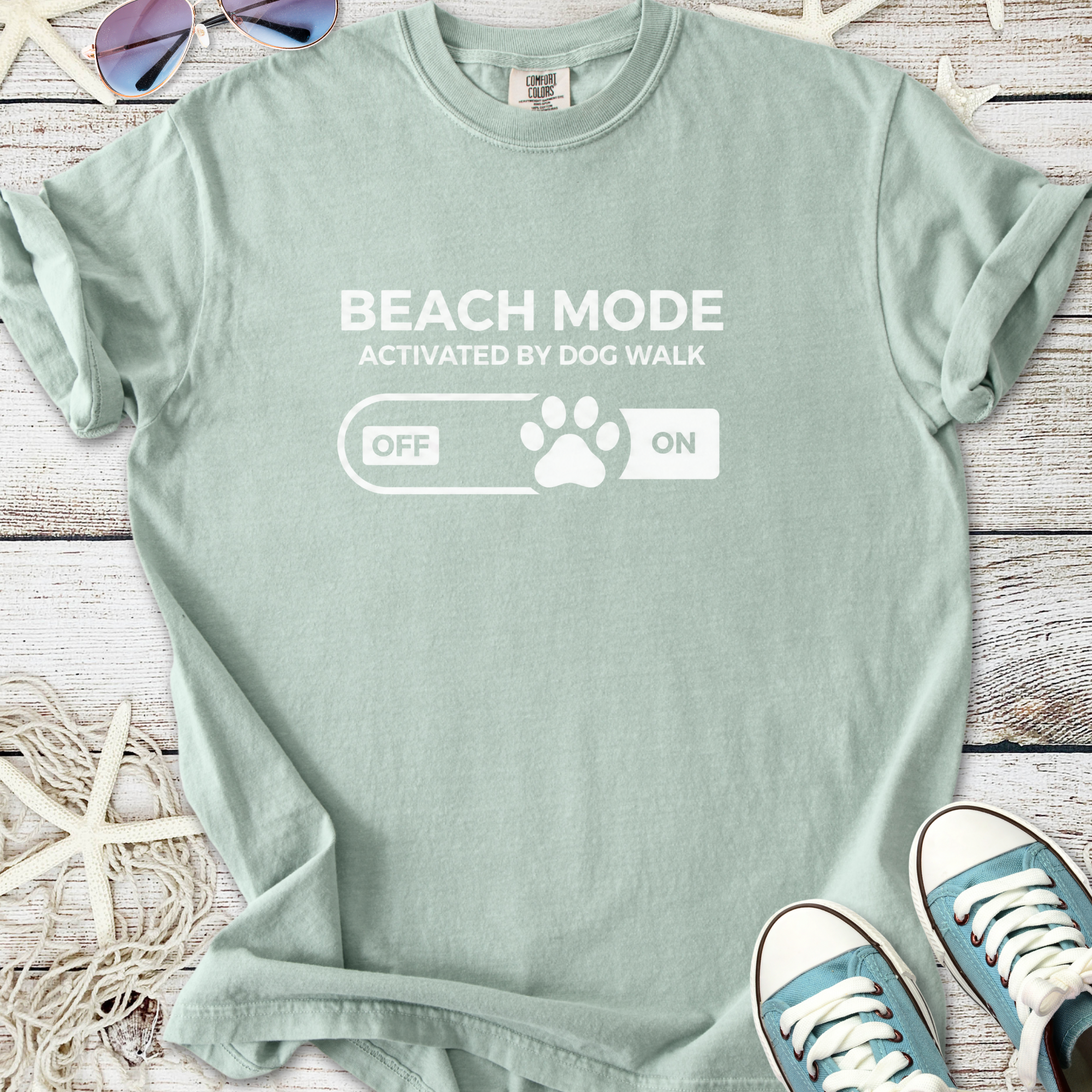 Mint green t-shirt featuring 'Beach Mode Activated by Dog Walk' graphic, perfect for dog lovers.