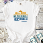 White graphic tee featuring 'No Alarm, No Schedule, No Problem' with sun design, perfect for casual wear.