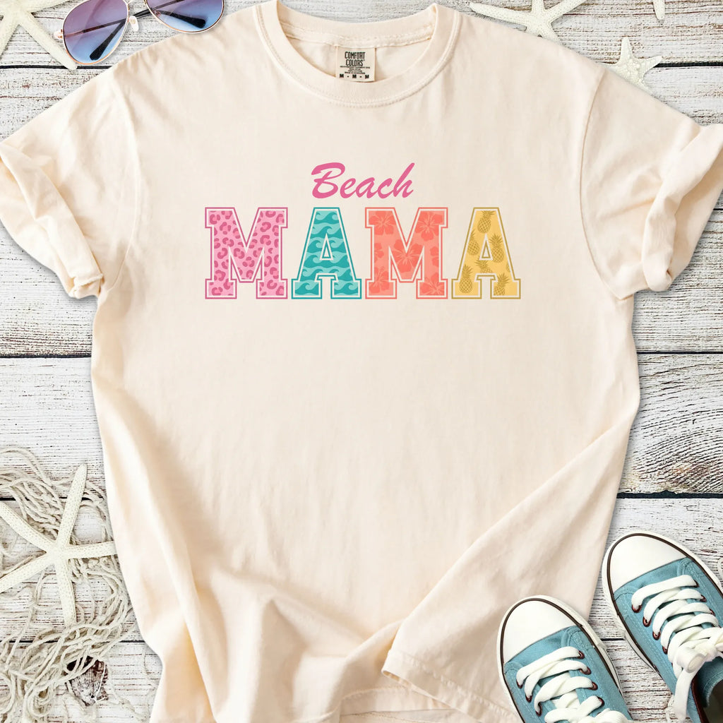 Cream Beach Mama t-shirt, colorful letter design, soft cotton fabric, perfect for summer outings.