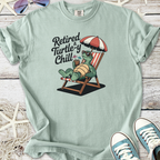 Light green t-shirt with 'Retired & Turtle-y Chill' design featuring a relaxing turtle.