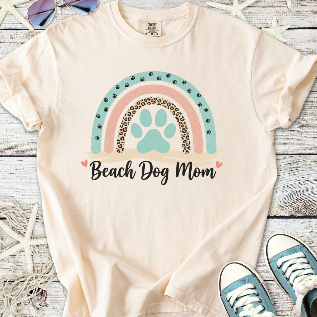 Cream t-shirt for dog lovers with 'Beach Dog Mom' graphic and colorful rainbow design